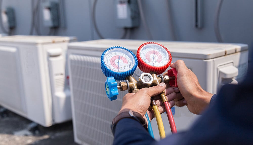 Kelly RAC technician testing HVAC equipment